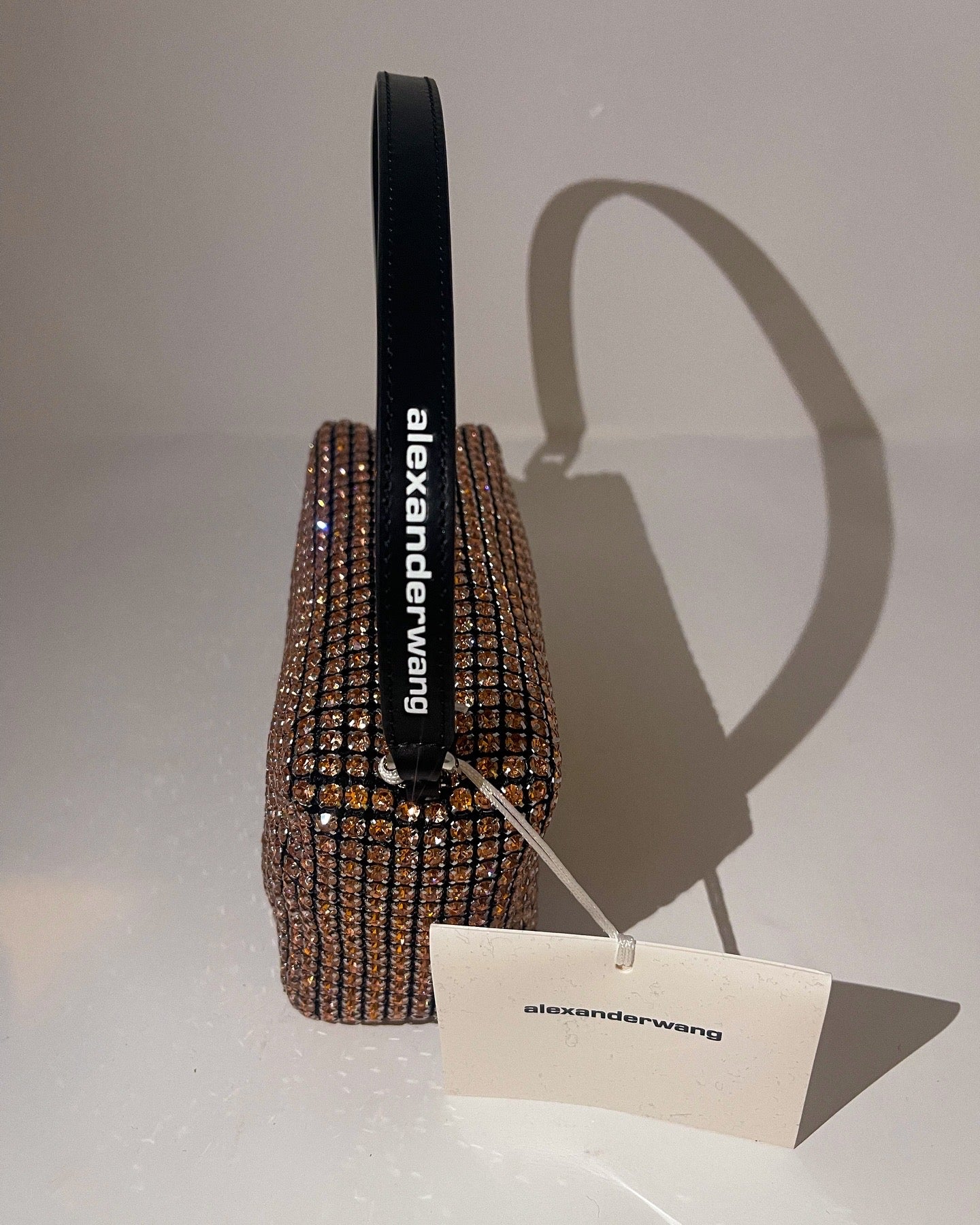 Alexander Wang Heiress Mesh Clutch Bag, featuring a shimmering mesh exterior and a sleek design. This glamorous clutch is perfect for evening events or special occasions. Retail price $952, available for $375