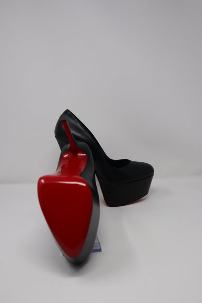 Christian Louboutin Shiny Calfskin Alta Vicky 160 Pumps featuring a towering 160mm platform heel and luxurious shiny calfskin leather with a round toe design. Finished with the iconic red sole for a bold and elegant statement.