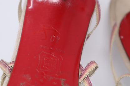 Christian Louboutin Sandals in fair condition, featuring leather straps and the signature red sole. These sandals require new heel taps but retain their elegant, designer appeal.