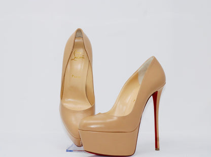 Christian Louboutin Shiny Calfskin Alta Vicky 160 Pumps featuring a 160mm platform heel with a round toe design. Made from luxurious shiny calfskin leather, these pumps include the signature red sole, offering bold height and style.