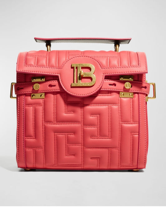 Balmain BBuzz 23 Top-Handle Bag in monogram quilted leather with gold-tone hardware, featuring the iconic Balmain logo. Luxurious and stylish, perfect for elevating any look. Retail price $2,750, available for $1,050.