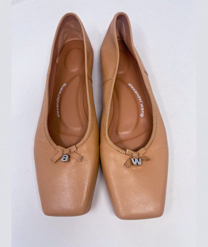 Alexander Wang Bille Square Toe Ballet Flats in a sleek, minimalist design. Featuring a contemporary square toe and smooth finish, these flats offer a stylish and comfortable option for everyday wear. Available in size 40. Condition: Excellent.