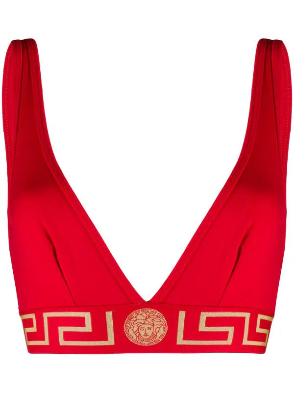 Versace Red Greca Border Bralette featuring a bold red hue with the signature Greca pattern. Made from soft, stretch fabric with an elasticized band for support. Stylish and comfortable, perfect for lounging or layering. Available in sizes 1 and 2.