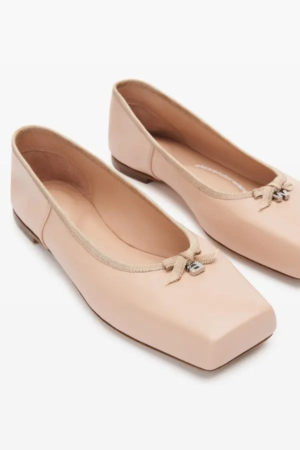 Alexander Wang Bille Square Toe Ballet Flats in a sleek, minimalist design. Featuring a contemporary square toe and smooth finish, these flats offer a stylish and comfortable option for everyday wear. Available in size 40. Condition: Excellent.