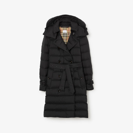 A sleek, mid-length Burberry nylon puffer coat featuring the brand's signature detailing. Perfect for winter, this luxurious coat combines warmth and style with a tailored fit, high collar, and durable zippers. Available in all sizes, it's a timeless piece of outerwear designed for both fashion and function