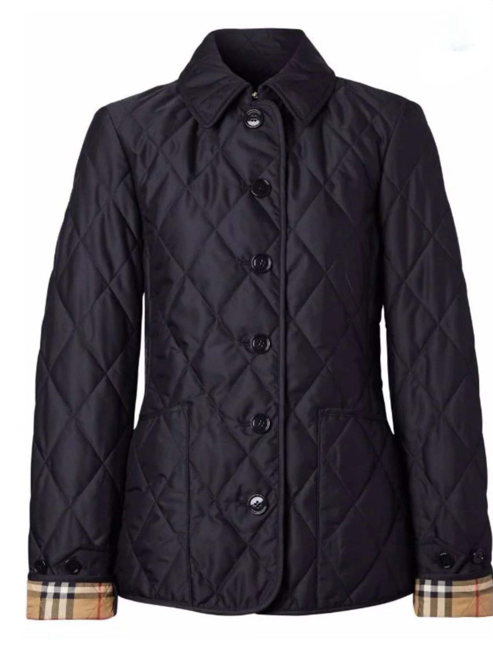 A sleek Burberry Fernleigh Quilted Jacket featuring a lightweight, quilted design with the Burberry logo subtly embroidered on the chest. This stylish jacket has a streamlined fit with a high collar and zip closure, perfect for layering and transitional weather.